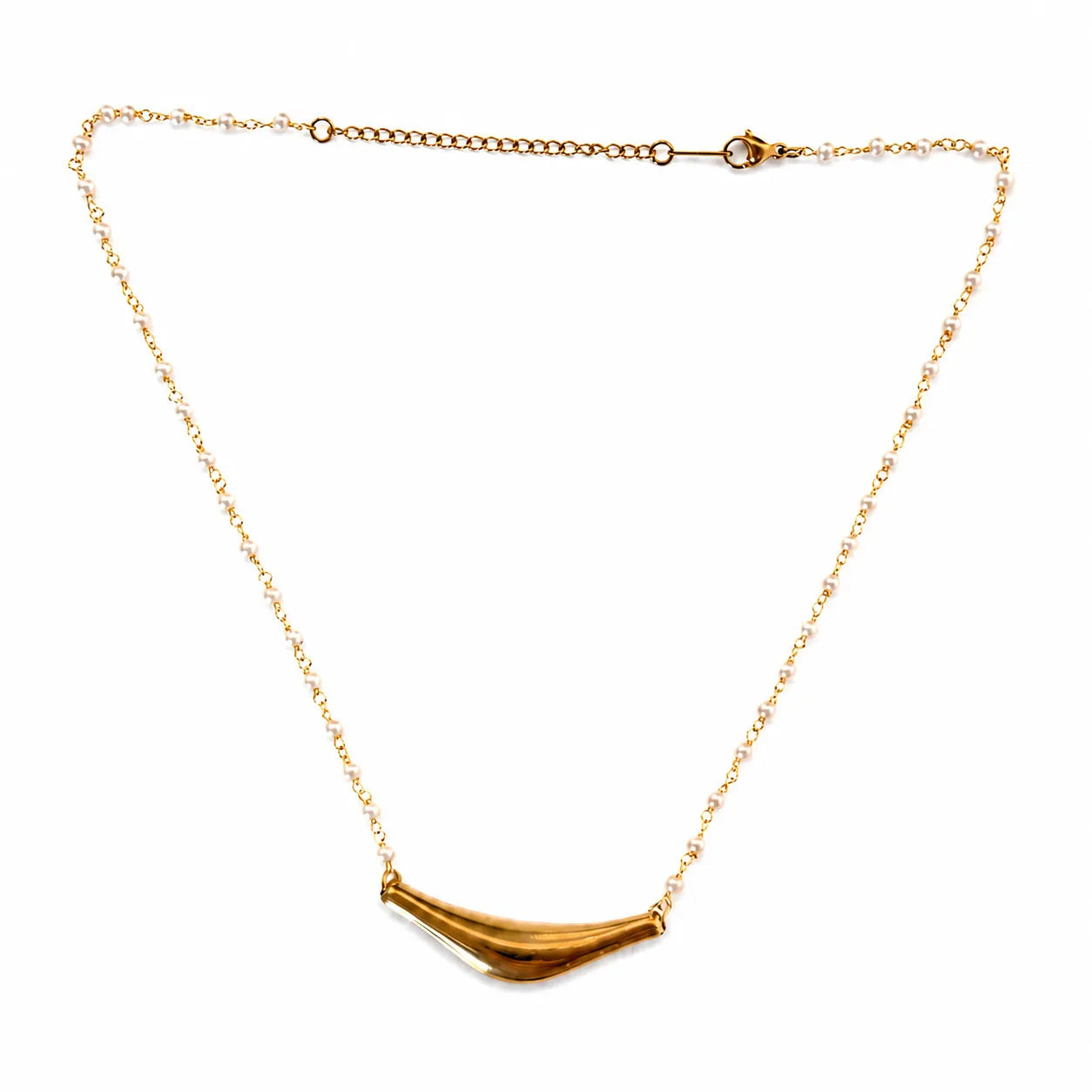 Gold necklace with a simple pendant on a white background