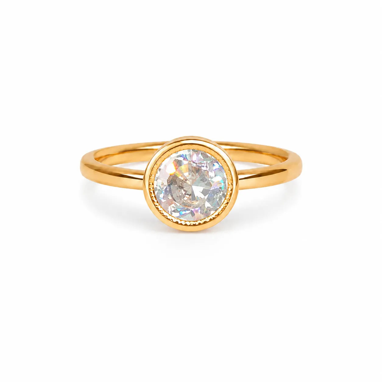 Gold ring with a diamond on a white background