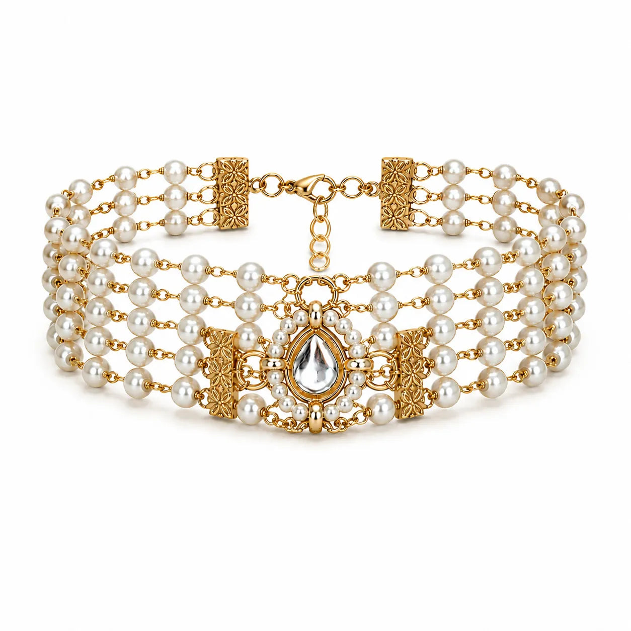 Gold and pearl bracelet on a white background