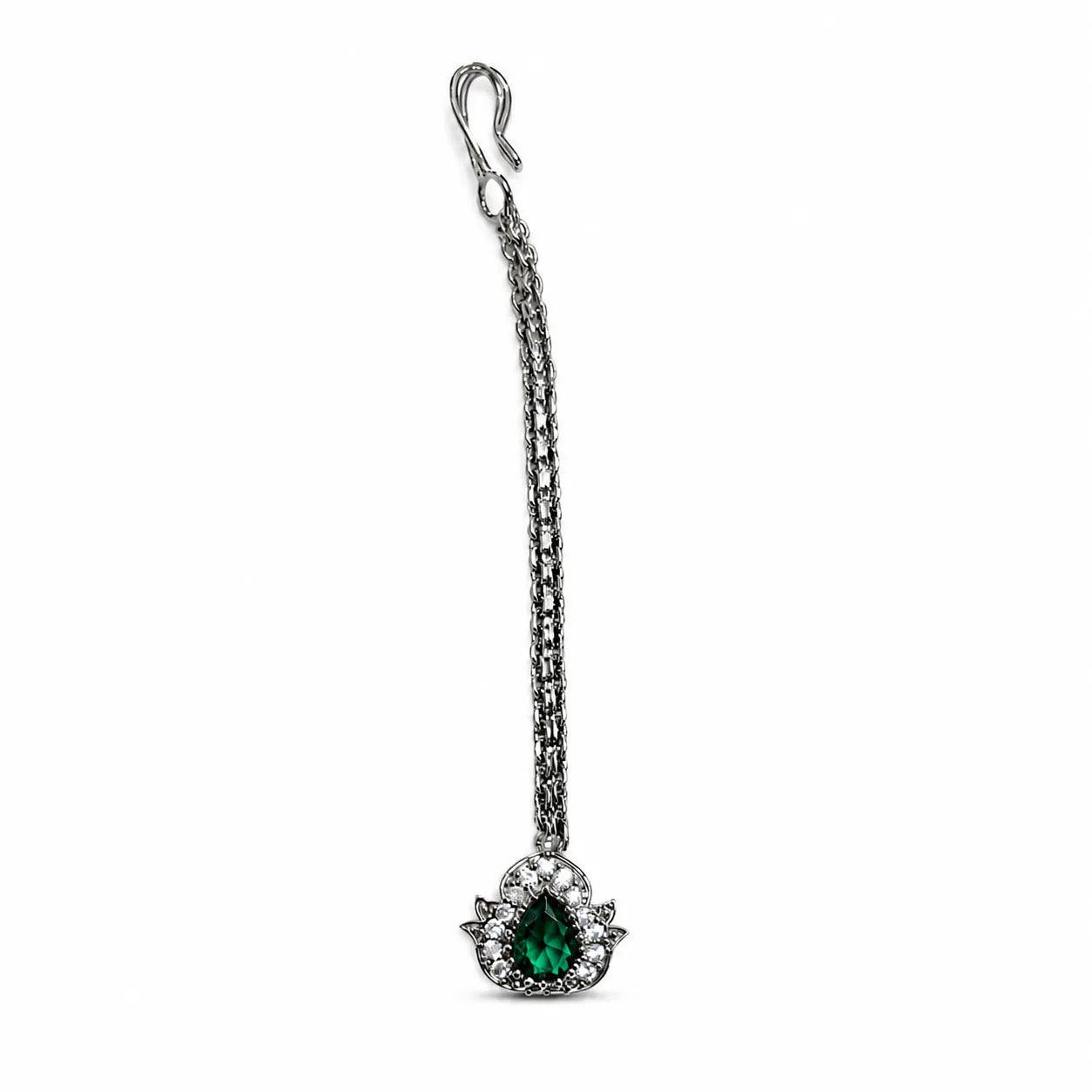 Silver pendant with a green gemstone on a white background
