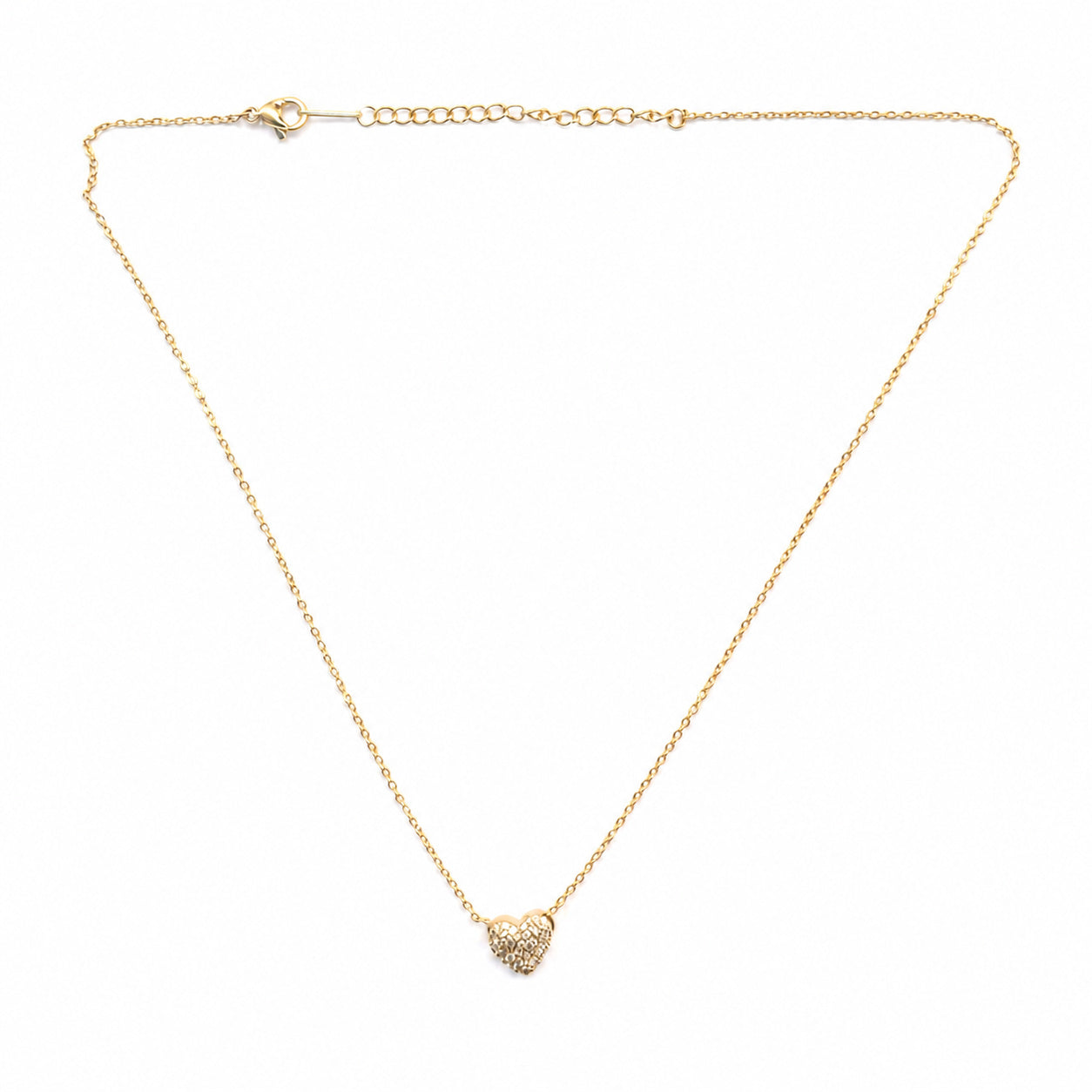 Gold necklace with a heart-shaped pendant on a white background