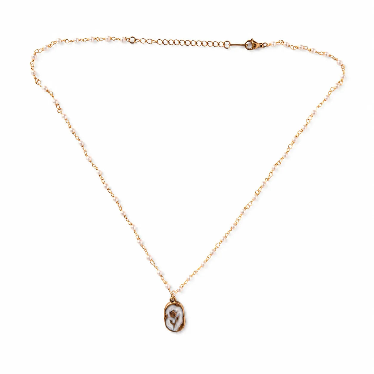 Gold necklace with a pendant on a white background
