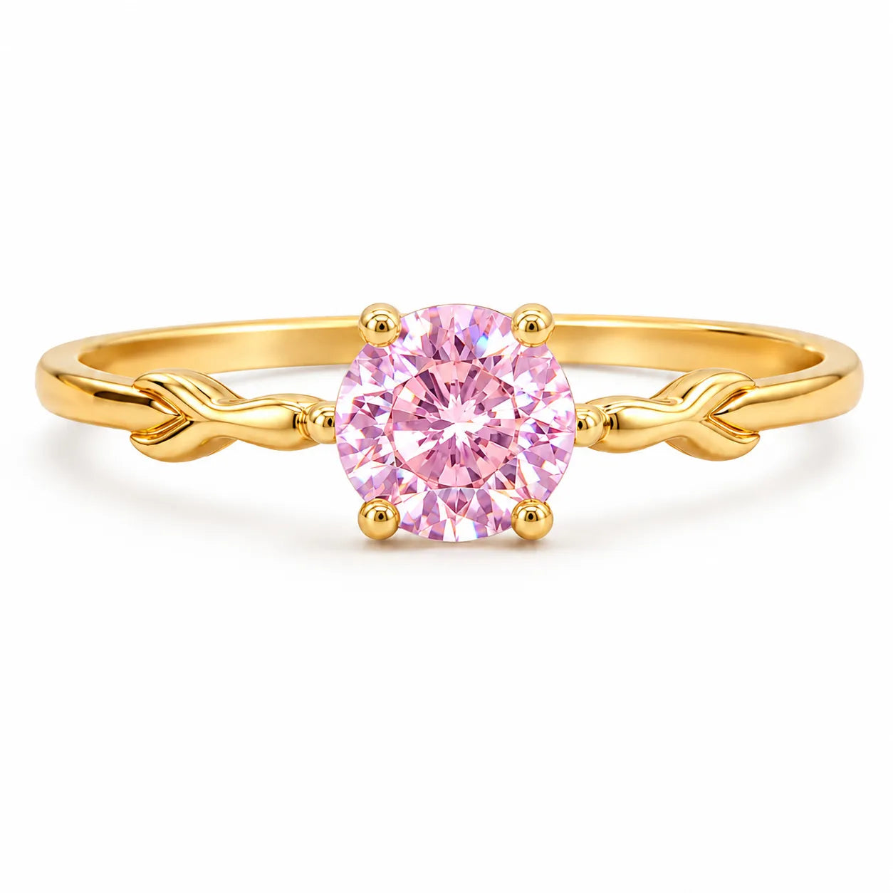 Gold ring with a pink gemstone on a white background