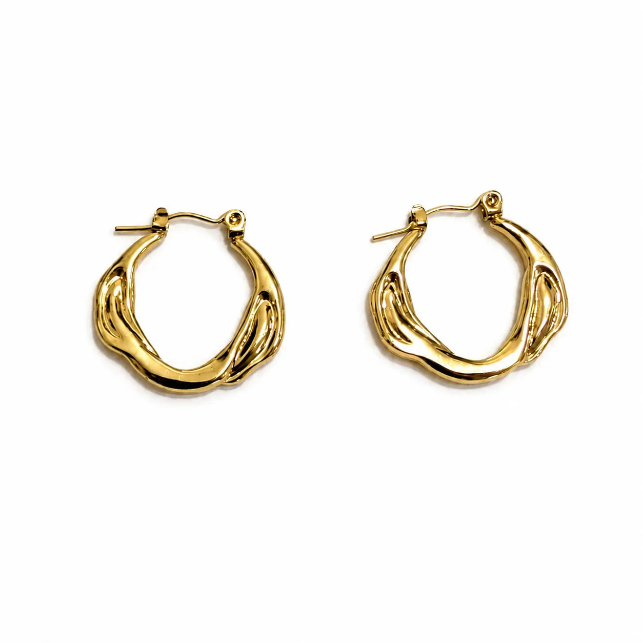 Gold hoop earrings on a white background