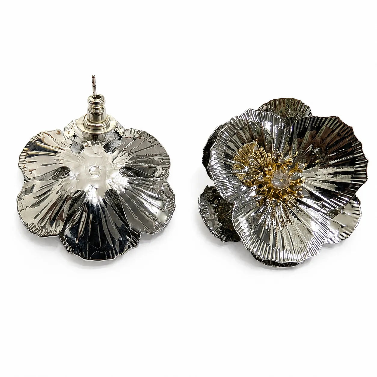 Floral earrings with metallic and clear design on a white background
