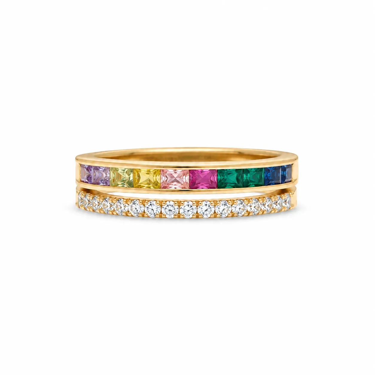 Gold ring with colorful gemstones on a white background