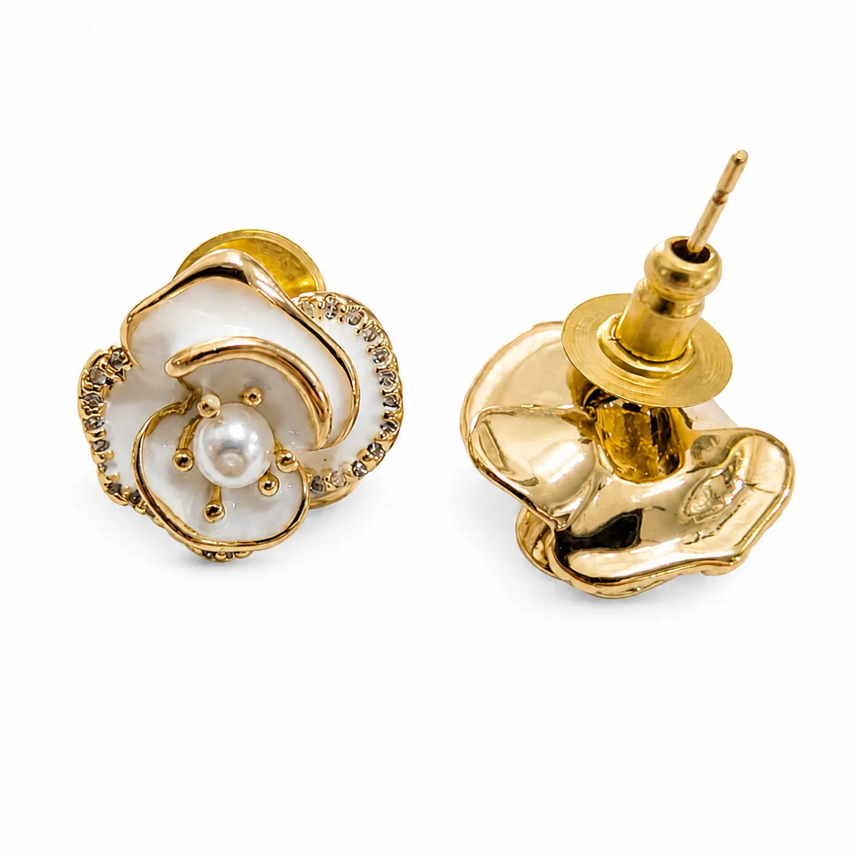 Gold and pearl flower-shaped earrings on a white background