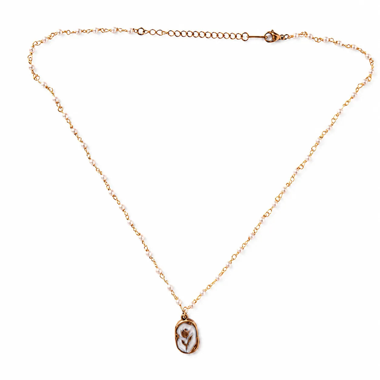 Gold necklace with a pendant on a white background