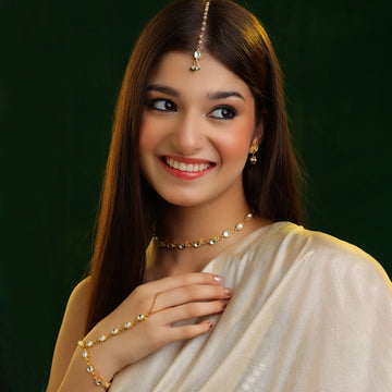 Shagun Hexagon Kundan Necklace Set with Haathphool & Maang Tikka