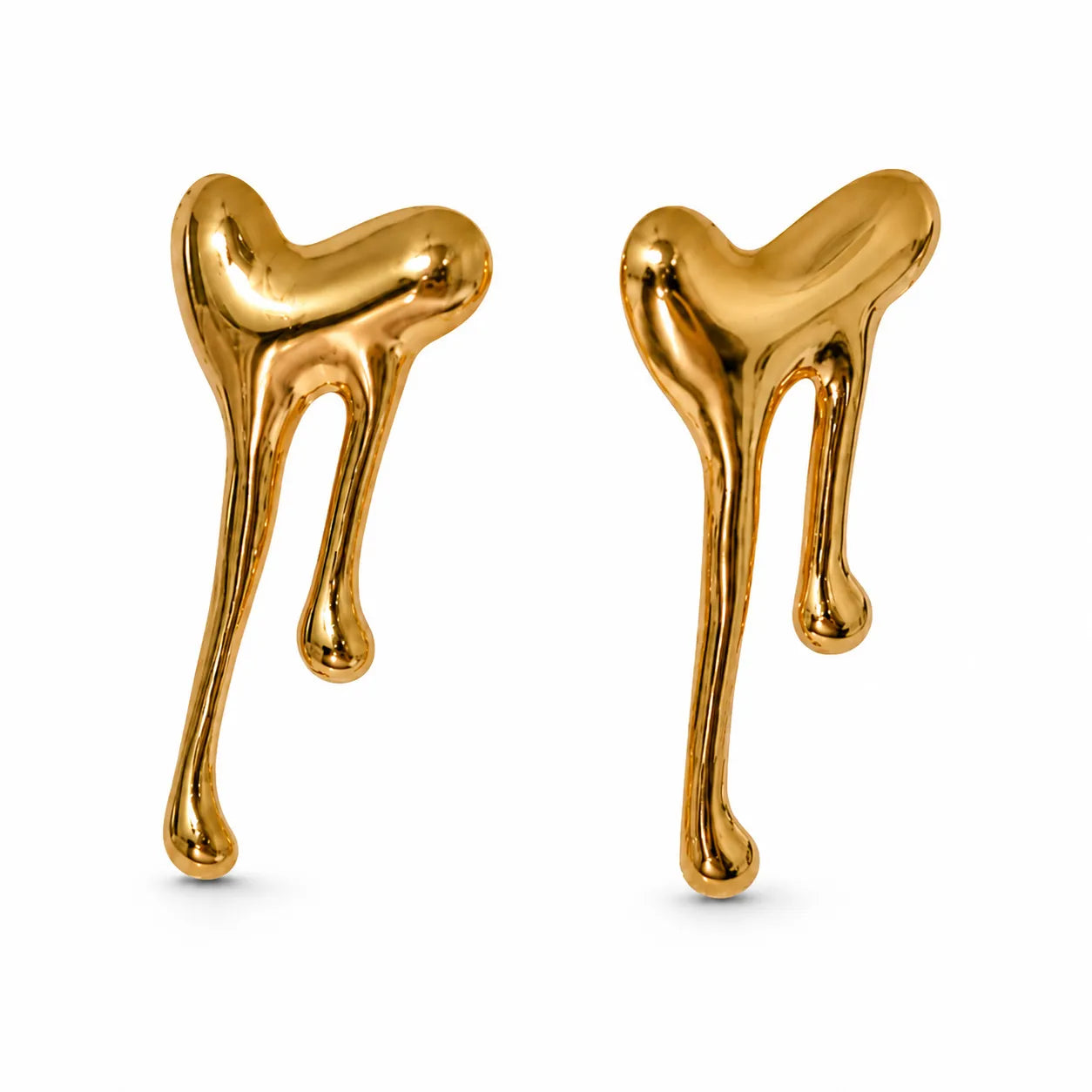 Gold abstract earrings on a white background