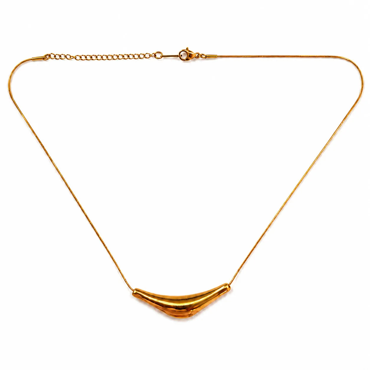 Gold necklace with a unique pendant on a white background