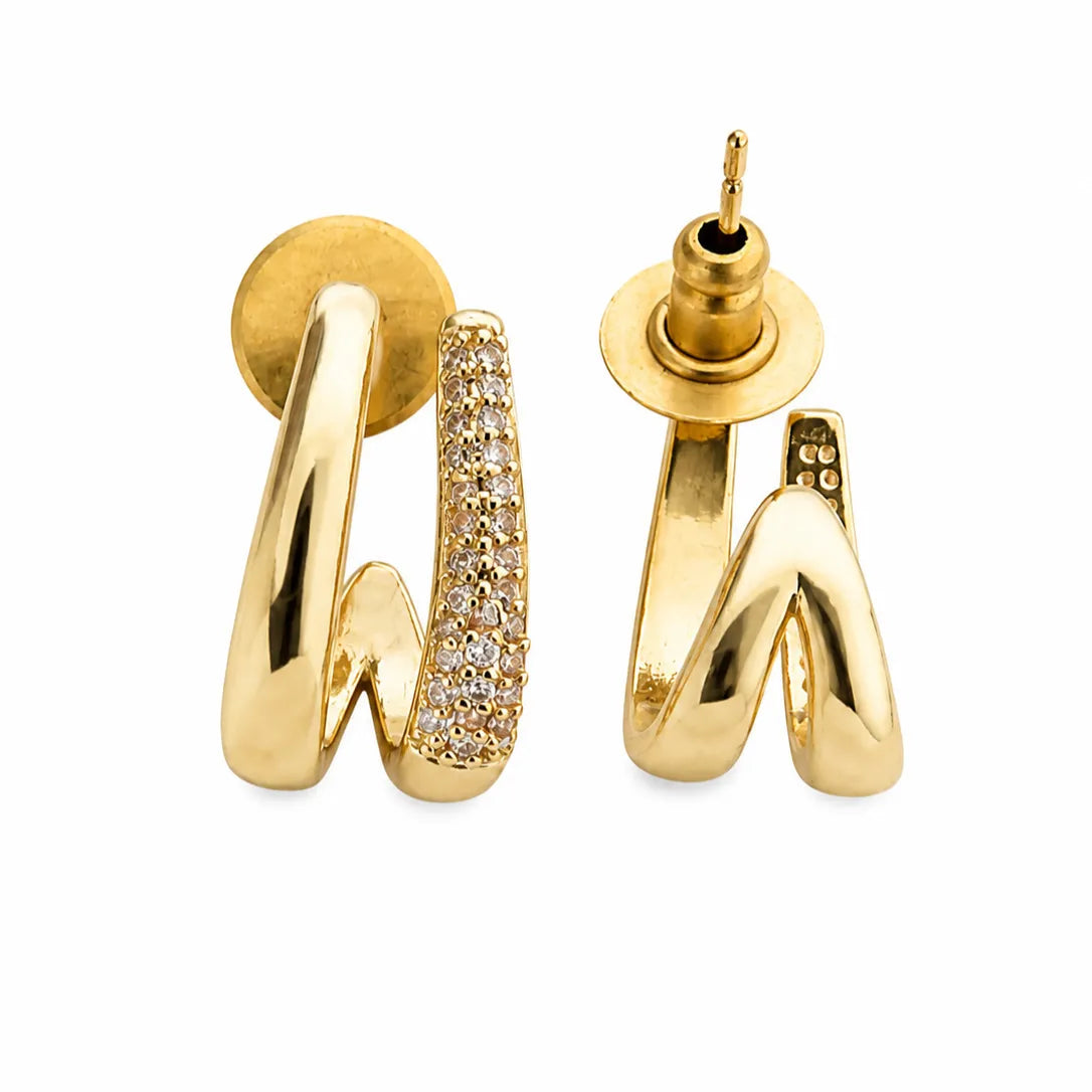 Gold hoop earrings with diamond accents on a white background