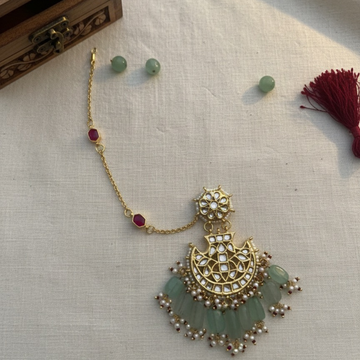 Golden Anti Tarnish Kanoti with Maroon Kundan Stones (set of 2)