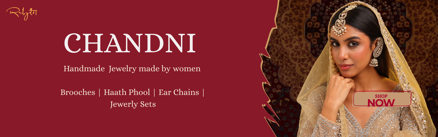 Campaign photo for Chandni jewelry with a woman wearing traditional jewelry against a red background.