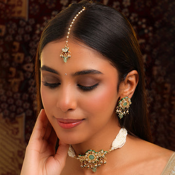 Ruby Raang Green-Gold Kundan neck piece with matching earrings and Maang Tikka