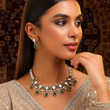 Ruby Raang Green stone kundan work necklace and matching earrings