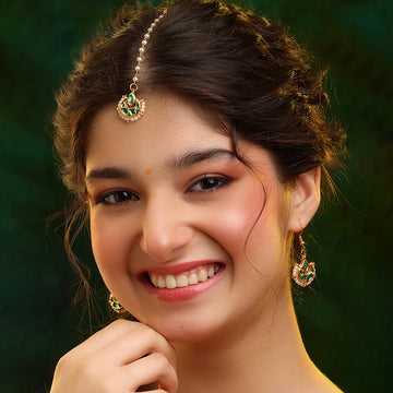 Ruby Raang Gold green Kundan earrings and Maang Tikka