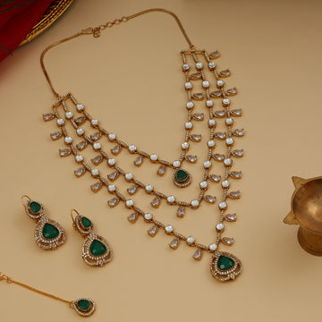 Layered Kundan and Emerald Necklace with Earrings and Maang Tikka